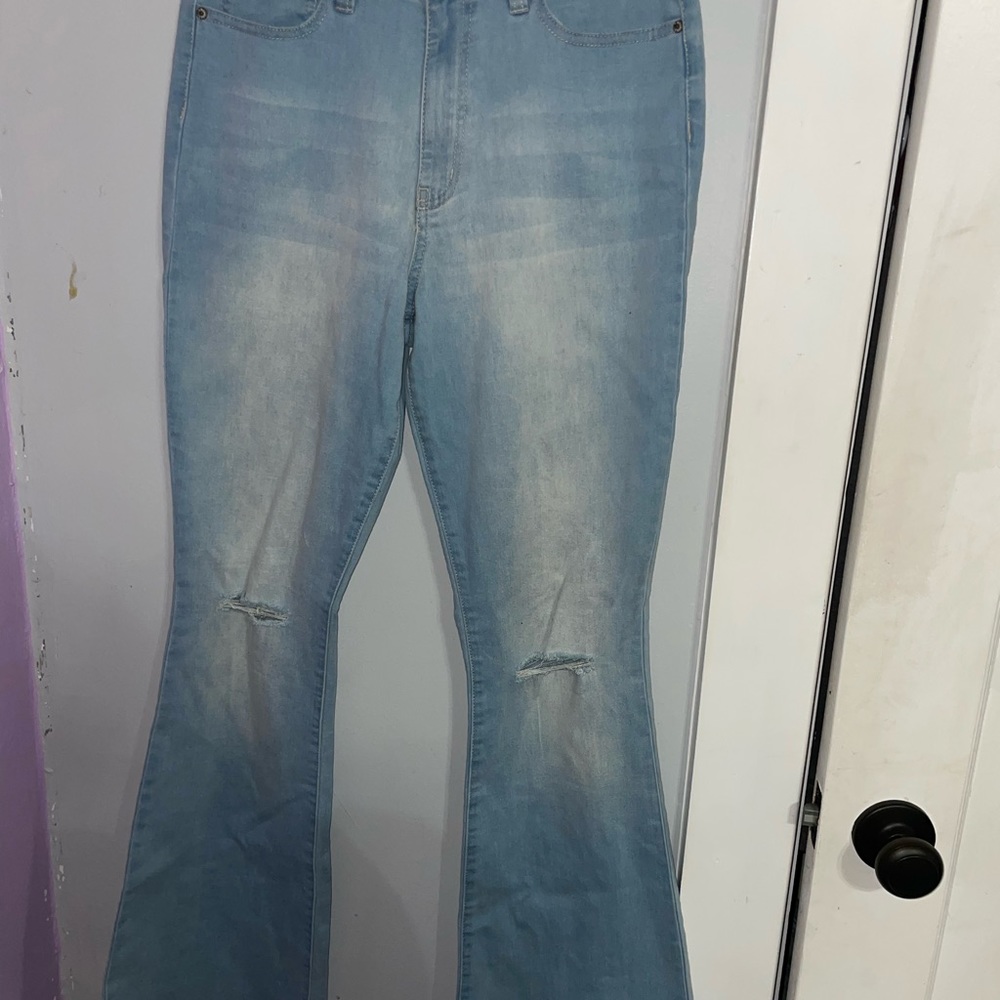 bell bottom light washed jeans